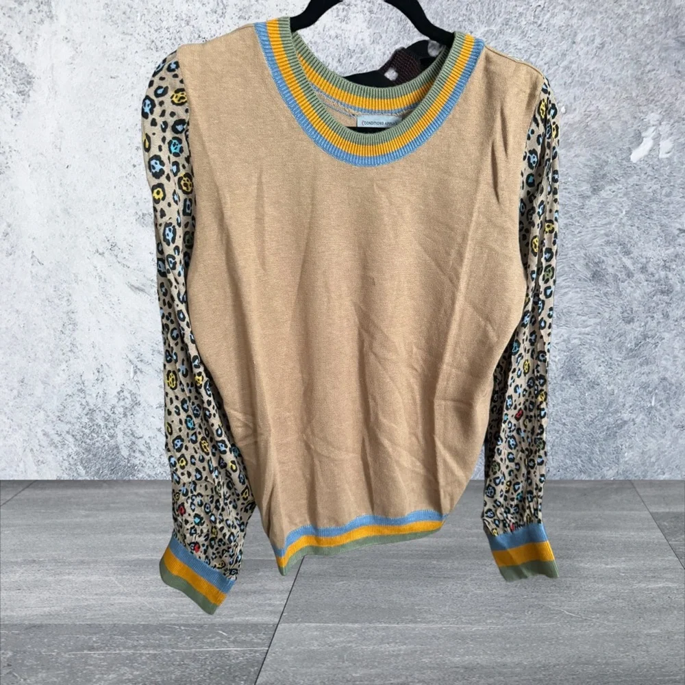 CONDITIONS APPLY for Bl^nk London Crew Neck Sweater with animal print sleeves
